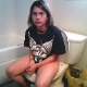 A girl wearing glasses records herself pissing and shitting while sitting on a toilet In 5 different scenes. Audible pooping and plop sounds, however, some are rather quiet. 117MB, MP4 file. Over 23.5 minutes.